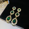 Novos brincos de agulha de prata estilo europeu e americano com diamantes, brincos de franja redondos em forma de gota d'água, brincos de luxo leve de alta qualidade, acessórios de orelha estilo corte vintage