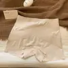 Pantalones cortos de seguridad y ropa interior dos en uno estilo verano fino para mujer anti-exposición seda de hielo sin costuras nuevo 2026 pantalones de capa base para niñas