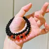 Pulseira Autêntica Estilo Vintage com Múltiplos Círculos de Calcedônia Vermelha Natural e Ágata Negra