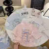 Camiseta Dulce para Niñas Verano 2026 Nueva Encaje Protección Solar Manga Corta Falso Dos Piezas Estilo Coreano Elegante Niña Pequeña Manga Corta