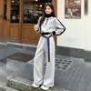 Conjunto casual esportivo para mulheres em estilo descontraído, super estiloso para o outono, conjunto de duas peças retrô que emagrece com moletom de cor contrastante e calça pantalona