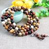 Pulsera de cuentas multi-tesoro al por mayor de fábrica 108 cuentas pulsera de sándalo colorida moda amantes hombres y mujeres joyería de mano
