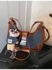 Bolsas de Nicho de Alta Qualidade Transfronteiriças para Mulheres Outono e Inverno 2025 Nova Moda Bolsa Transversal de Ombro Único Estilo Coreano Popular Bolsa Dumpling