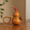 Peça de Mão de Cabaza Natural com Design Versátil, Adequada como Acessório de Bolsa para Homens e Mulheres, um Brinquedo para Alívio do Estresse para Mãos Pequenas