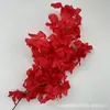 Flor roja de simulación diseño de auditorio de bodas paisajismo pared de fondo de flores artificiales decoración techo de flores camino de flores guía arreglo floral flor