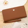 Bolsa de mão transfronteiriça, em estoque, estilo longo, com textura de padrão lichia, carteira feminina com design de coração, simples e minimalista, grande capacidade, e múltiplos compartimentos para cartões, perfeita como porta-moedas de mão