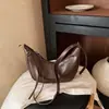 Bolsa de Design de Nicho Estilo Coreano Grande Capacidade 2026 Nova Tendência Fashionável Retrô Toque de Luxo Ombro Único Transversal Bolsa Bolinho
