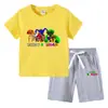 Camiseta infantil de verano 2023, nueva ropa infantil de comercio exterior, pantalones de manga corta de algodón coreano para niños, traje de dos piezas