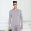 Nuevo traje de ropa interior térmica de terciopelo dorado para hombre y mujer con forro polar a prueba de frío ropa de otoño para parejas pantalones largos engrosados