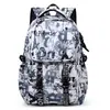 Mochila escolar nueva, elegante y versátil para niños, simple y única con letras de grafiti, gran capacidad, bolsa escolar casual para estudiantes de preparatoria
