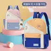 Primavera 2023 nueva mochila escolar de jardín de infantes de color de contraste grande, mediana y pequeña linda caricatura mochila para niños pequeños