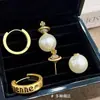 Pendientes Vintage de Perlas Planeta Estilo Francés para Mujer, Pendientes de Lujo Ligero de Nicho de Gama Alta, Elegantes Accesorios para Orejas Versátiles de Otoño e Invierno