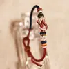 Pulsera de Nudo Dimple Flor de Durazno Tejida a Mano DIY Usable con Cuentas de Transferencia Doradas y Cordón Rojo como Regalo para Tu Novia
