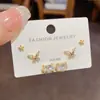 Moda Japonesa y Coreana Simple Pequeño Mariposa de Diamantes Completos Gatito Combinación Traje Pendientes Pin de Plata S925 Pendientes Versátiles para el Trabajo