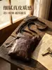 Bolso bandolera de piel de vaca de capa superior transfronterizo para mujer, bolso de almacenamiento portátil vintage de cuero genuino, bolsa de maquillaje duradera de gran capacidad