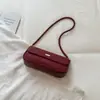 Otoño temprano 2026 nueva moda casual única bolso de hombro moderno para mujer diseño de nicho bolso retro para debajo del brazo