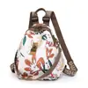 Mochila de viaje ligera de moda para mujer, bolsa nueva de tela de nailon impermeable, mochila casual para compras de mujer
