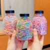 Venta al por mayor niños bebé banda para el cabello banda de goma de alta elasticidad nueva enlatada desechable banda de goma para el cabello cuerda para el cabello