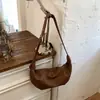 2026 Nova Bolsa Transversal Feminina Texturizada de Grande Capacidade Fofa Retrô Outono e Inverno Bolsa Chifre Nicho para o Dia a Dia Bolsa Bolinho