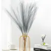 Hierba de pampa artificial corta de seis puntas transfronteriza flor de simulación en stock decoración del hogar pluma de simulación accesorios de boda al por mayor