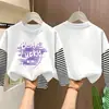 Camiseta de manga larga a rayas de algodón puro para niñas, colección primavera/otoño 2026, estilo nuevo, diseño de caricatura lindo, capa base versátil y a la moda