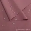Pantalones de Nailon Chaqueta Tela para Ropa Spandex Elástico en Cuatro Direcciones Transpirable Impermeable Anti-arrugas Agradable al Tacto Tela para Ropa de Diseñador