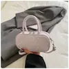Bolso de lunares de nicho transfronterizo para mujer, nuevo y exquisito minibolso cruzado versátil 2026, bolso cilíndrico de un solo hombro a la moda