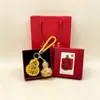 Chaveiro Pingente Dourado do Ano da Ovelha com Decoração em Folha de Ouro Conjunto em Caixa de Presente Personalizado para Negócios Presente Personalizado Atacado