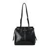Bolso de axila retro de nicho para mujer, nueva moda de verano 2026, de alta gama, ultratrendy, exquisito bolso de hombro para el día a día