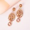 Pendientes de estilo retro europeo y americano con forma de gota de aleación de diamantes, pendientes de personalidad femenina, pendientes transfronterizos de tendencia, venta al por mayor