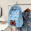 Mochila de Grande Capacidade 2026 Novo Estilo Fashionável e Estilosa Bolsa Escolar para Alunos do Ensino Médio Mochila Casual Infantil e Fofa para Homens e Mulheres