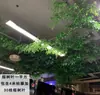 Ramas de flor de cerezo flor de durazno falsa plantas verdes de techo decoración enredaderas de flores de interior pared de celebridad de internet supermercado restaurante habitación cubierta superior fealdad