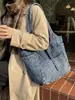 Bolso de mezclilla retro casual 2026 nuevo bolso tote bolso de mano versátil para el trabajo bolso tote de gran capacidad