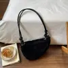 Bolso de felpa transfronterizo para mujer invierno 2026 estampado de leopardo estilo nuevo moderno versátil de un solo hombro axila bandolera bolso de viajero bolsa de albóndiga