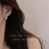 Aretes de Ojo de Gato Love Diseño de Nicho Sentido de la Moda Pendientes de Alto Sentido 2024 Nuevos Estallidos Pendientes Simples Versátiles