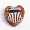 Mini piano de pulgar de 8 tonos de cristal pequeño lindo fácil de llevar mini colgante de celebridad de internet mini instrumento musical al por mayor