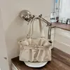 Bolsa retrô de alta qualidade feminina 2026 novo estilo para o dia a dia bolsa de ombro única de grande capacidade bolsa tote plissada estilo balde