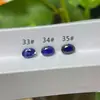 Em estoque, Não. 33 safiras sintéticas, formato oval de ovo de pombo, corte regular, corindo azul artificial