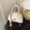 Bolso pequeño de alta gama transfronterizo para mujer, nueva versión coreana 2026, bolso tipo almohada simple, diseño de nicho, bolso de mano, bolso de hombro, bolso cruzado