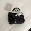 Bolso tote de gran capacidad para mujer, nuevo modelo de verano 2026, bolso de hombro casual texturizado, bolso de axila para el trabajo, bolso de mano de alta gama