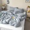 Estilo INS color sólido algodón puro algodón lavado artículo individual funda de edredón funda de edredón 100% algodón juego de tres piezas estudiante doble juego de tres piezas ropa de cama