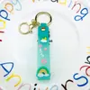 Chaveiro Criativo Desenho Animado Cor Transparente Arco-Íris PVC Borracha Macia Corda de Couro Bolsa de Boneca Frasco de Óleo Flutuante Acessórios para Pendurar