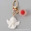 Llavero Colgante de Moda Ángel de Alas Blancas Bola de Color Gelatina Accesorio Personalizado para Bolso y Funda de Auriculares
