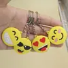 Puesto producto nuevo creativo joyería pequeña PVC cara sonriente colgante de llave regalo pequeño gota de pegamento expresión llavero venta al por mayor