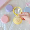 Color Macarrón Plegable Bolsa de Aire Peine Peine Masajeador Espejo Integrado Portátil Mini Peine de Cojín de Aire Peine Pequeño para Niñas