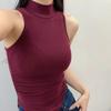 Chaleco de cuello alto ajustado para mujer, estilo 'hot girl', color liso de invierno, camiseta interior adelgazante, top irregular sin mangas
