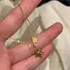 Otoño e Invierno Nuevo Dorado Navideño Atmósfera Invernal Asimétrico Copo de Nieve Collar Femenino Elegante Cadena de Clavícula de Alta Calidad