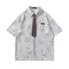 Camisa Masculina com Estampa de Bambu em Tinta Lavada Texturizada, Manga Curta, Design de Verão, Gola Lapela Solta Tendência