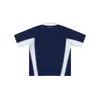 Moda casual para uso diario, estilo retro deportivo primavera/verano, camisa polo de manga corta con retazos en blanco y negro, mangas raglán acanaladas y corte holgado