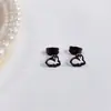Aretes de Tuerca Geométricos de Estrella de Acero Titanio con Bolas de Acero Grandes y Pequeñas de Moda Simple al por Mayor de Fábrica de Venta Caliente Aretes Perforados Mujeres